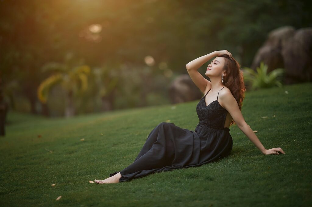 "Woman, nature, grass, sunset, portrait, dress, countryside, beauty, happiness, lifestyle, garden, model, fashion, style, colours trendz kurtis from a leading women's clothing shop in Kochi."