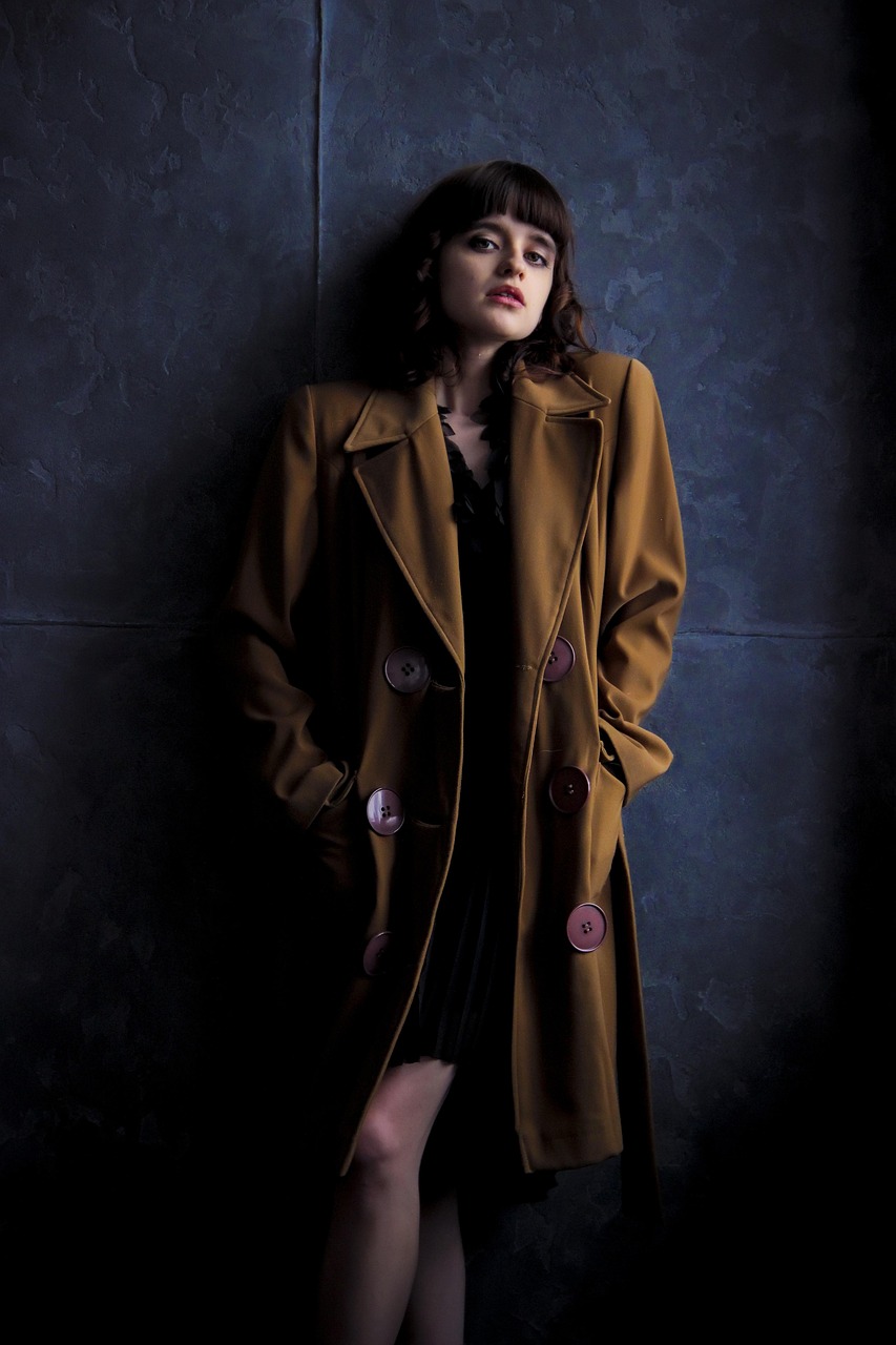 Young woman, coat, old coat, brown coat, girl in coat, retro, dark background, model, style, beauty, sight, pose, hairstyle, photosession, wall, gorgeous, views, classic, legs, iPhone wallpaper, coat, featuring patola print kurtis.